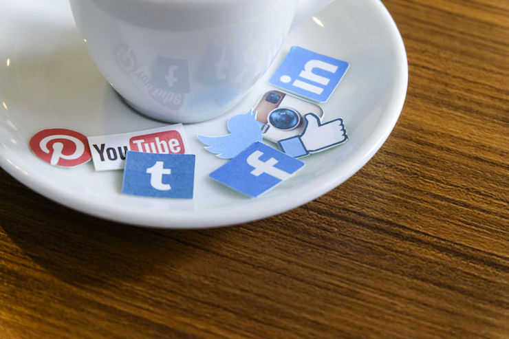 social icons on a coffee saucer