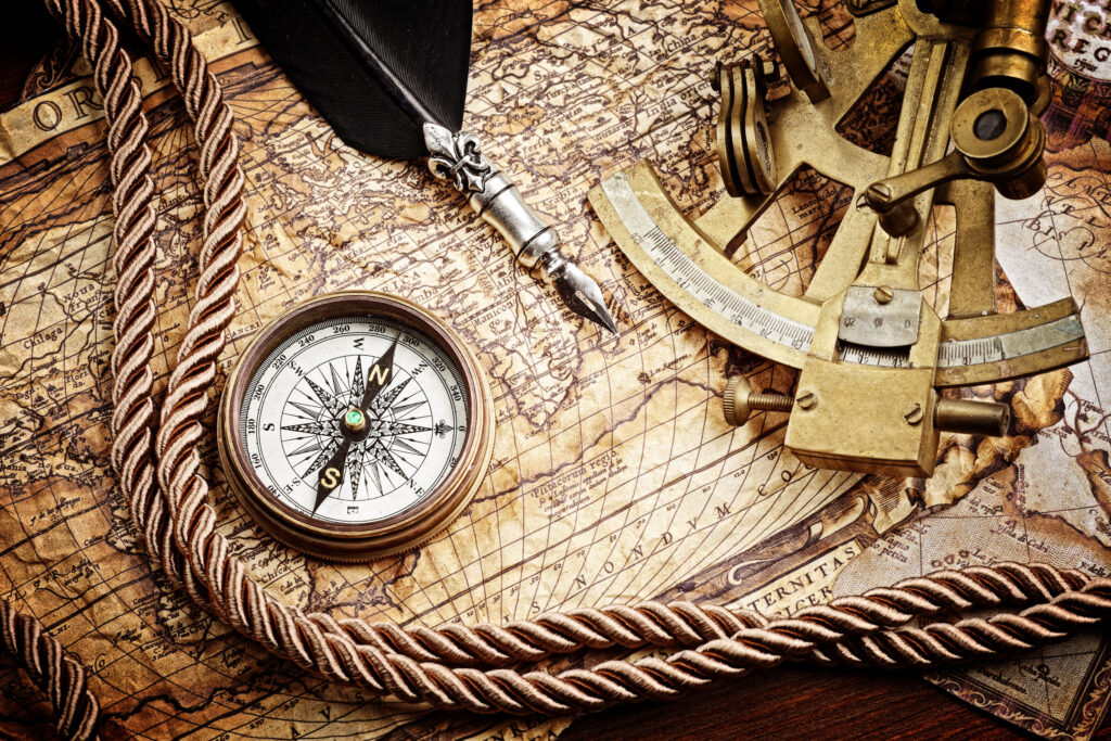  vintage still life with compass,sextant and old map